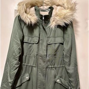 Cupcakes and cashmere light weight parka with faux fur detachable hood.